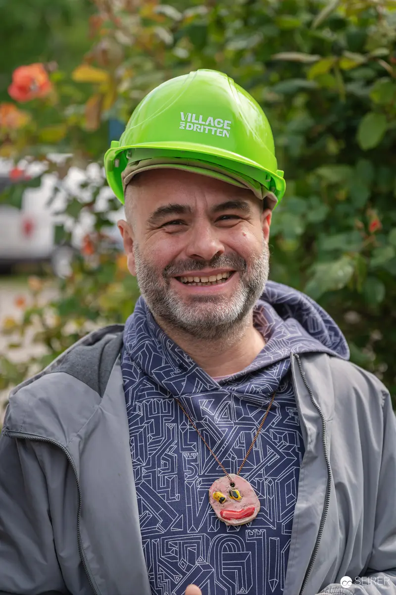 Construction Worker at Village Quarter Development Press Preview