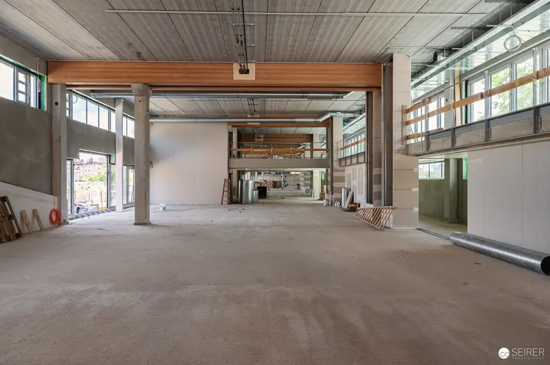 Multi-Level Construction Site with Exposed Concrete and Industrial Infrastructure