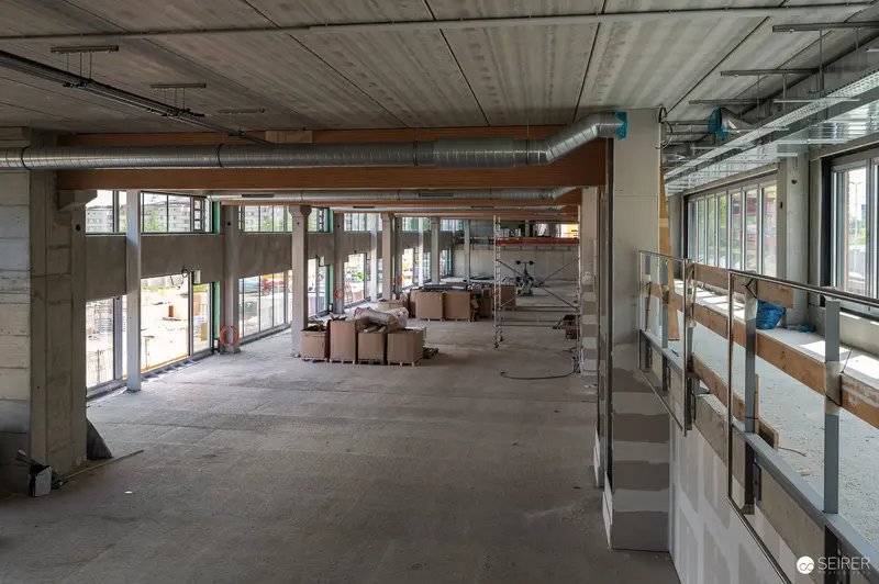 Construction Site Interior with Exposed Concrete and Industrial Infrastructure