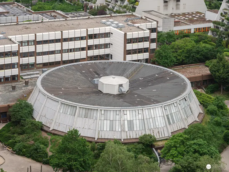 Unique Circular Architecture: Modern Institutional Building with Distinctive Disc-Shaped Design