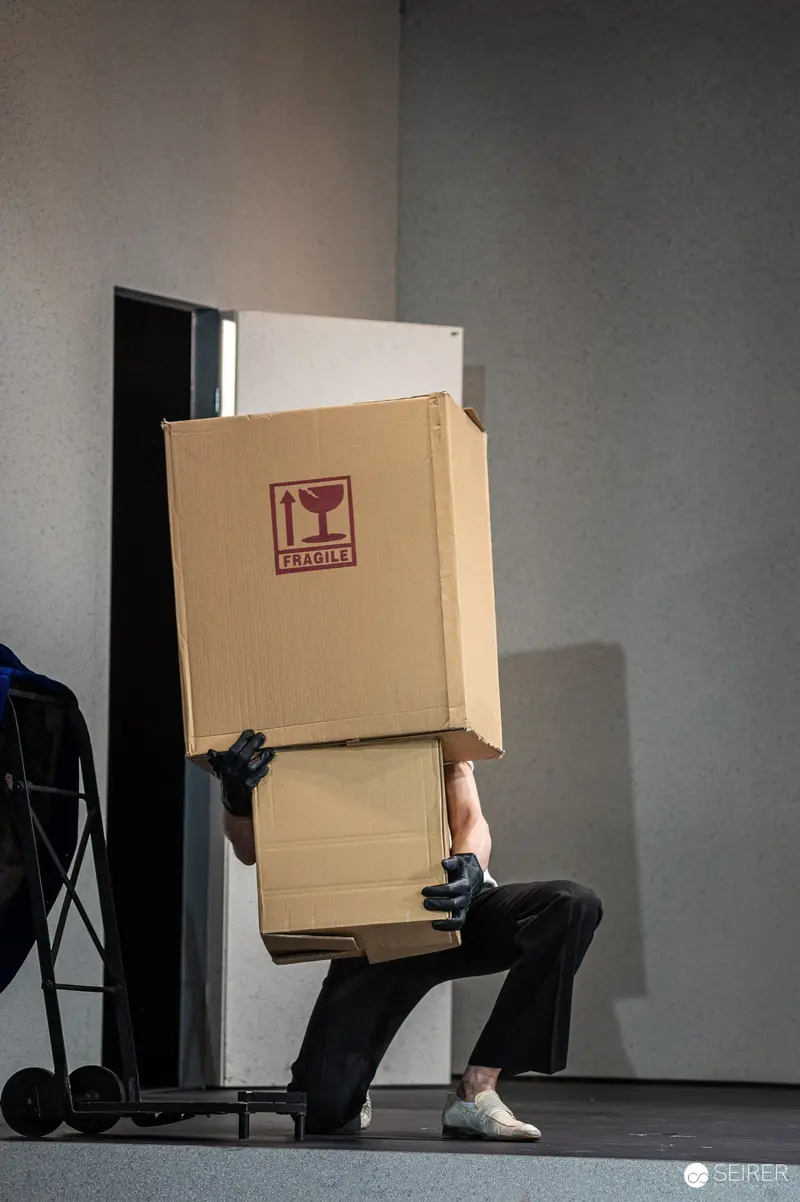 Performer Balancing Cardboard Box at Theater in der Josefstadt, May 2024