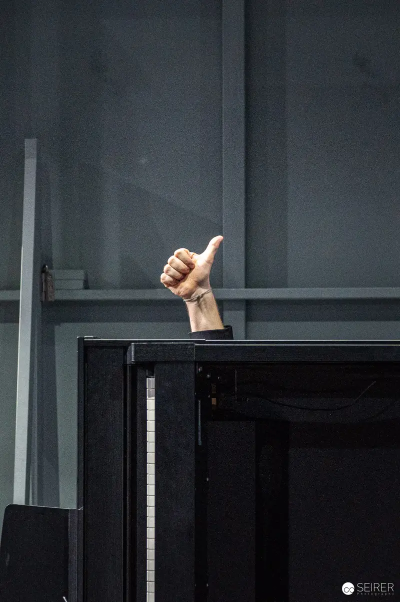 Thumbs-Up Gesture During "Trilogie der Sommerfrische" Rehearsal at Theater in der Josefstadt