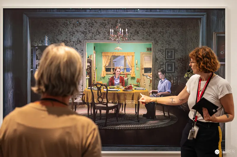 Albertina Guide Explains Gregory Crewdson Dining-Room Tableau to Visitor, Vienna 2024