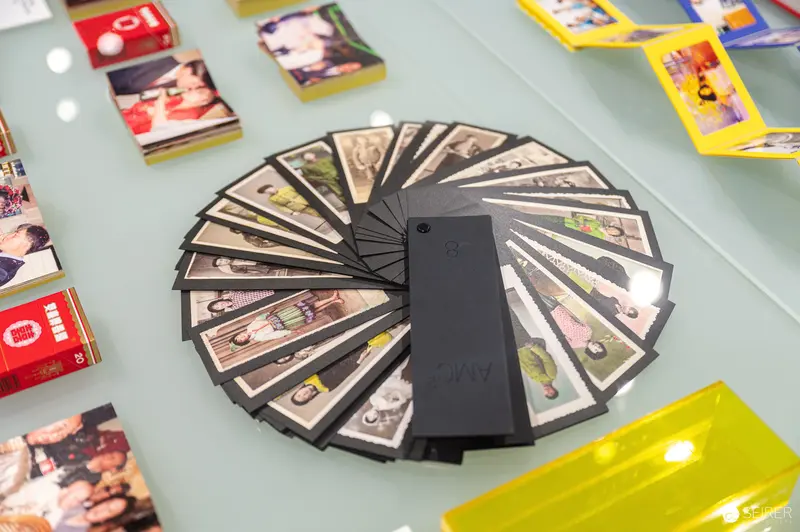 WestLicht Gallery Event: Vintage Collectible Cards Displayed in Radial Arrangement