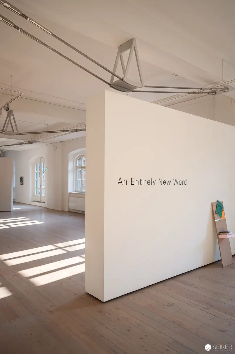 Art Exhibition Space "An Entirely New Word" with Minimalist White Wall Display