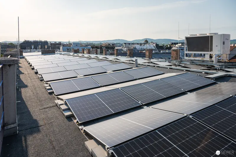 Rooftop Solar Panel Installation on Urban Building Complex