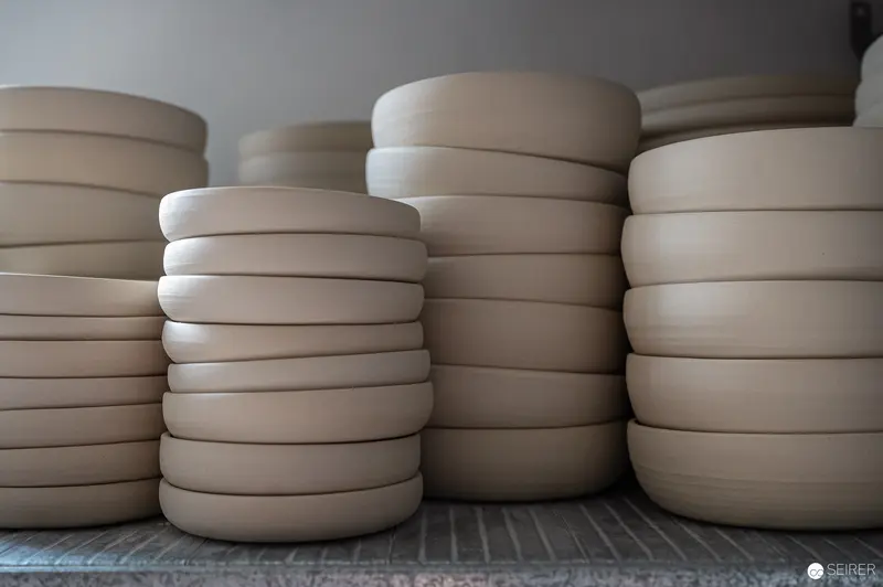 Stacked Unglazed Ceramic Bowls in Neutral Tones