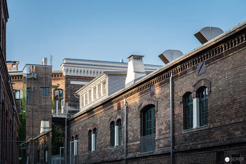 Architectural Details of Historic Urban Brick Buildings in Soft Afternoon Light