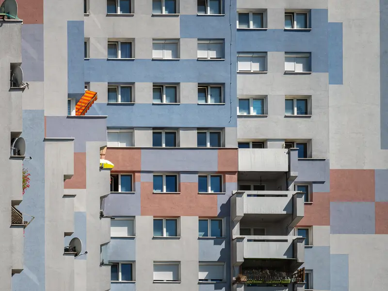 Geometric Residential Architecture with Colorful Balconies in Urban Setting