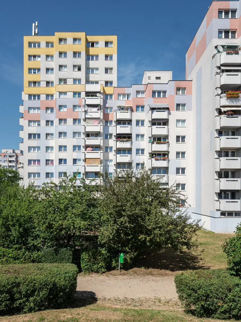 Communist-Era Residential Towers with Green Landscaping in Suburban Setting