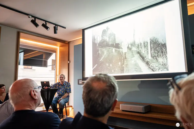 Martin Parr at Leica Gallery Vienna, August 22, 2024. Martin Parr Artist Talk at Leica Gallery Vienna, Projected Historical Image