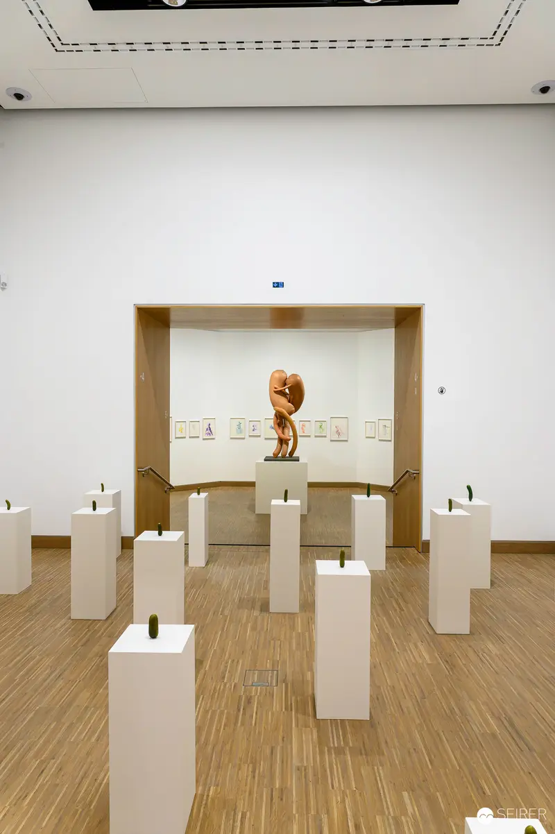 Erwin Wurm Exhibition at ALBERTINA MODERN: Sculptural Installation of White Pedestals