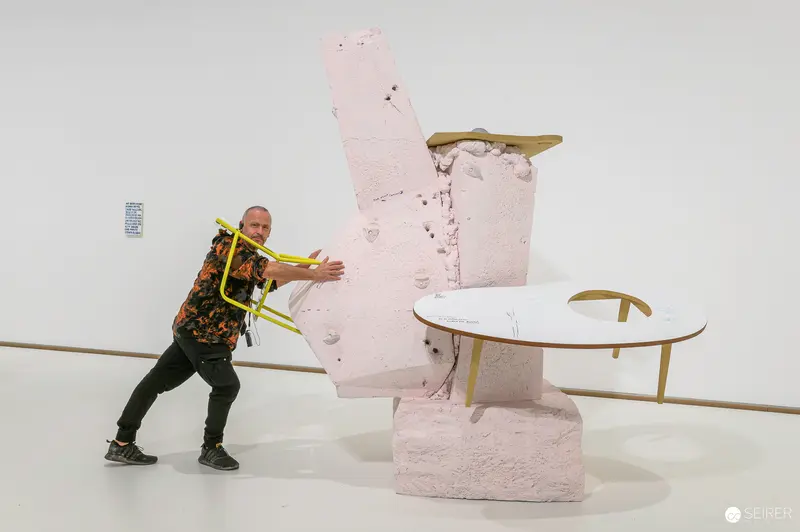 Erwin Wurm Performing Sculptural Interaction at ALBERTINA MODERN Retrospective