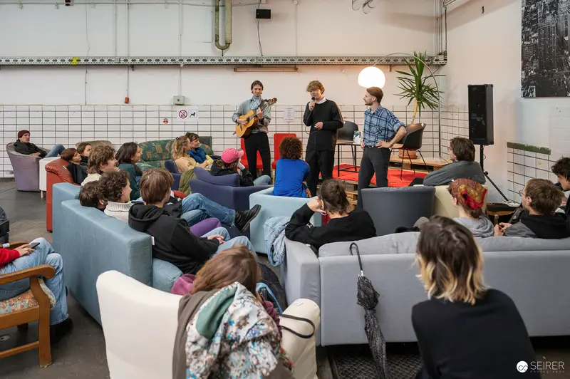 Acoustic Performance at Intimate Indoor Literary Reading Event