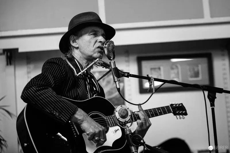 Ernst Molden Performing Acoustic Guitar at Carla Mittersteig Private Concert