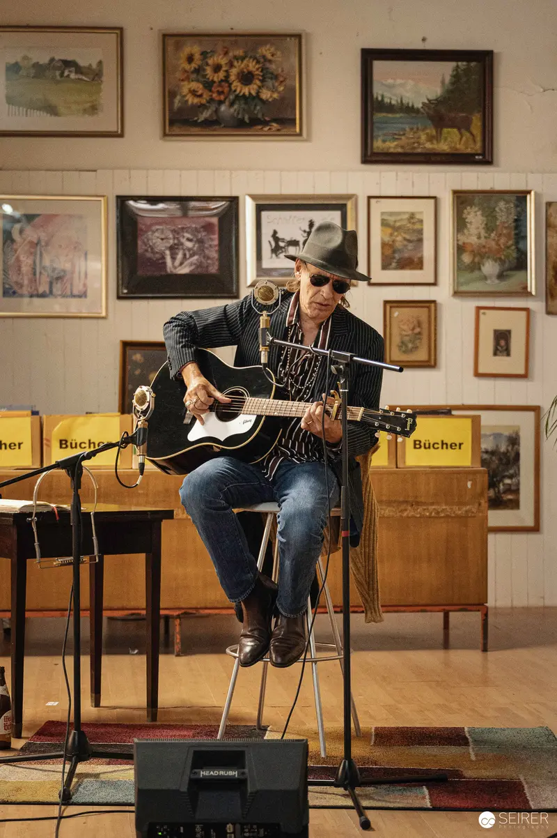 Ernst Molden Performing Acoustic Guitar at Carla Mittersteig Private Concert