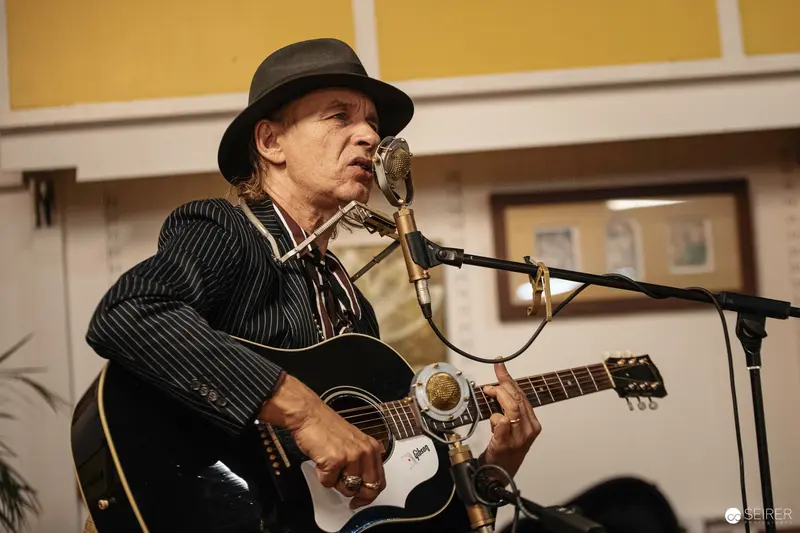 Ernst Molden Performing Acoustic Guitar at Carla Mittersteig Private Concert