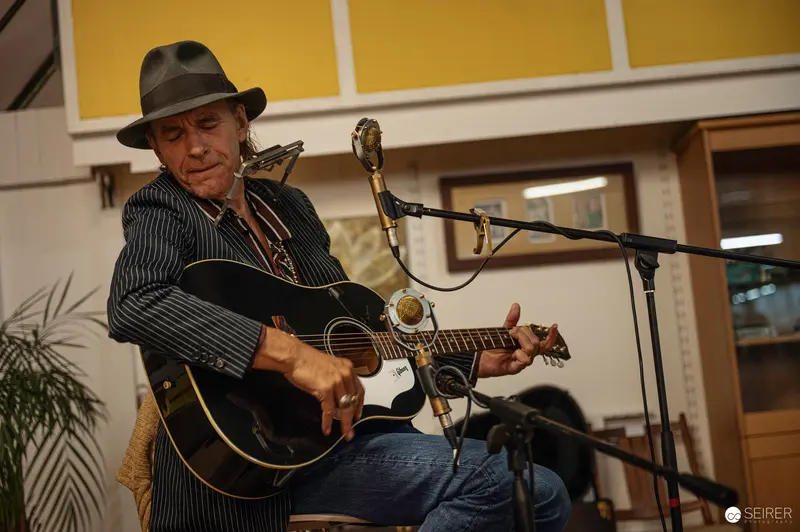 Ernst Molden Performing Acoustic Guitar at Carla Mittersteig Private Concert