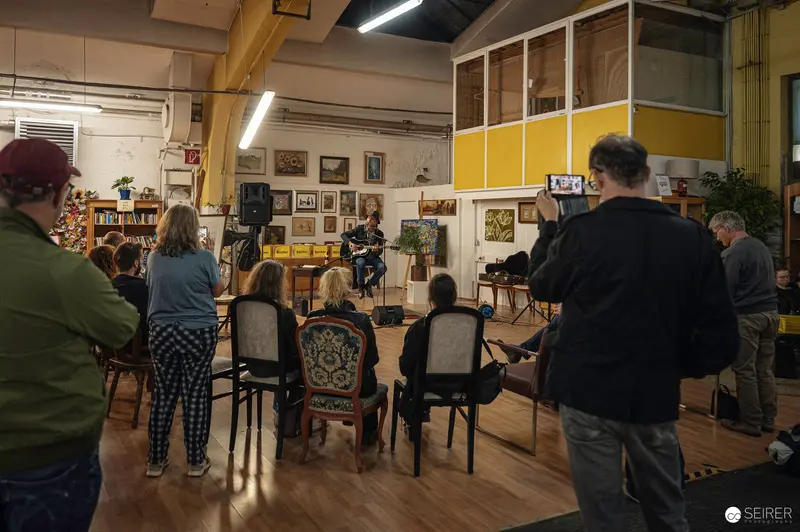 Ernst Molden Performing Intimate Acoustic Set at Carla Mittersteig Venue