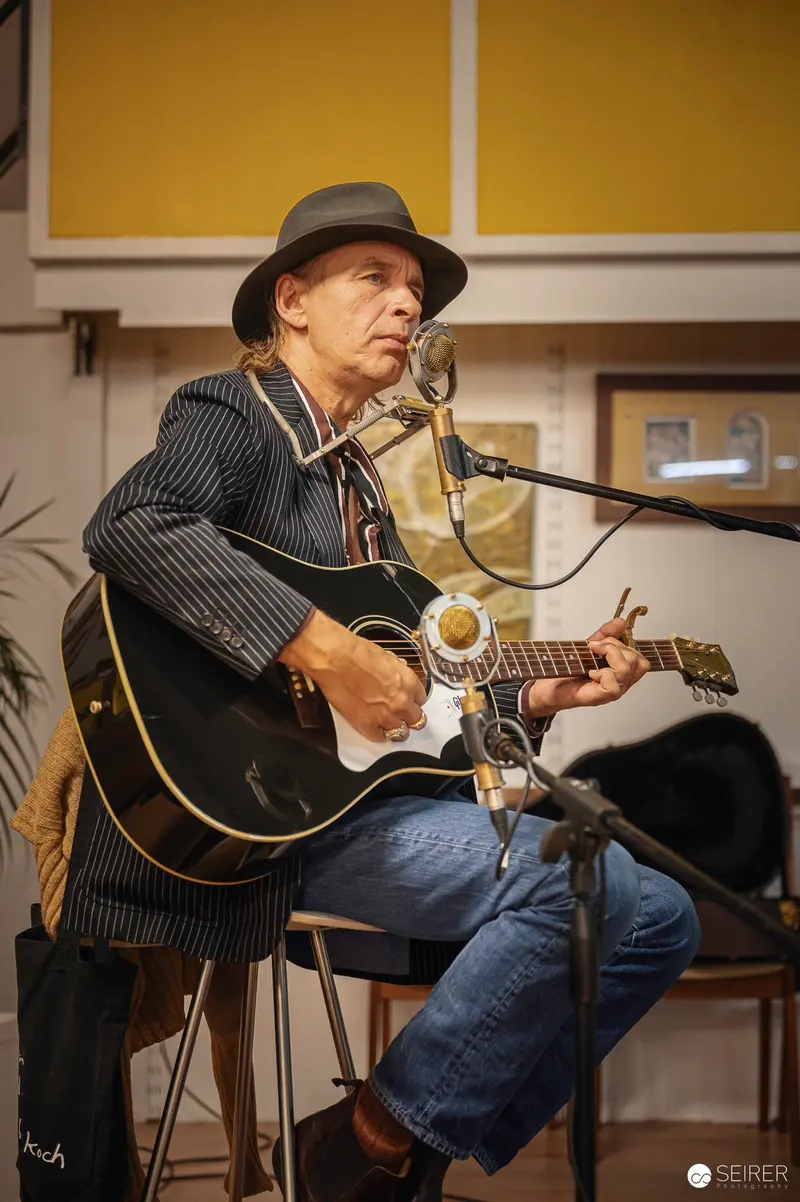Ernst Molden Performing Acoustic Guitar Set at Carla Mittersteig Private Concert