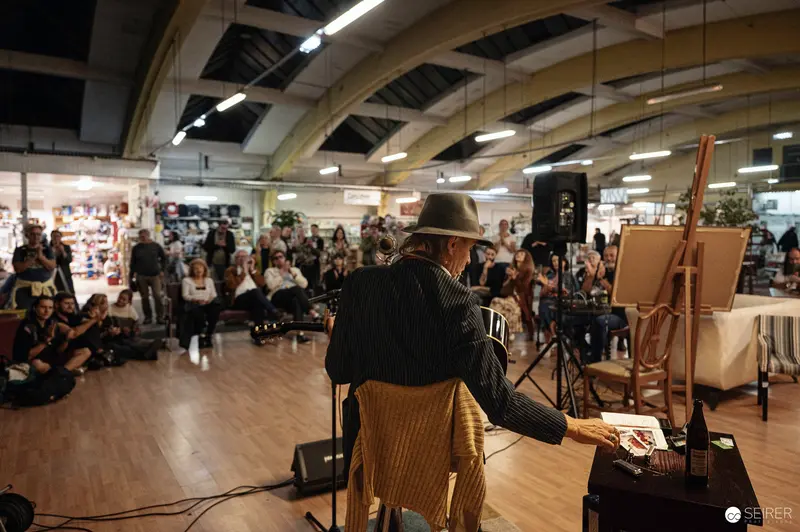 Ernst Molden Performing Acoustic Set at Carla Mittersteig Venue