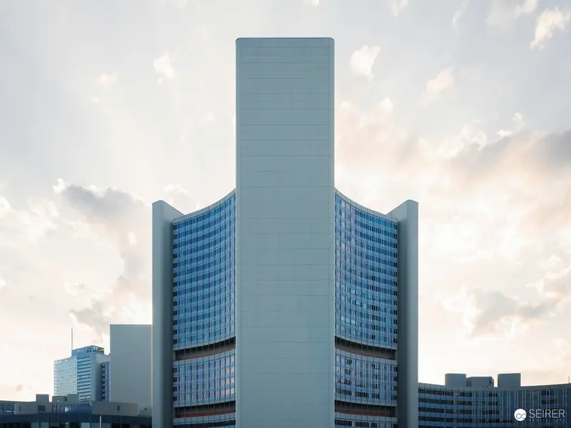 Geometric Modern Architecture at Vienna International Center with Cloudy Sky