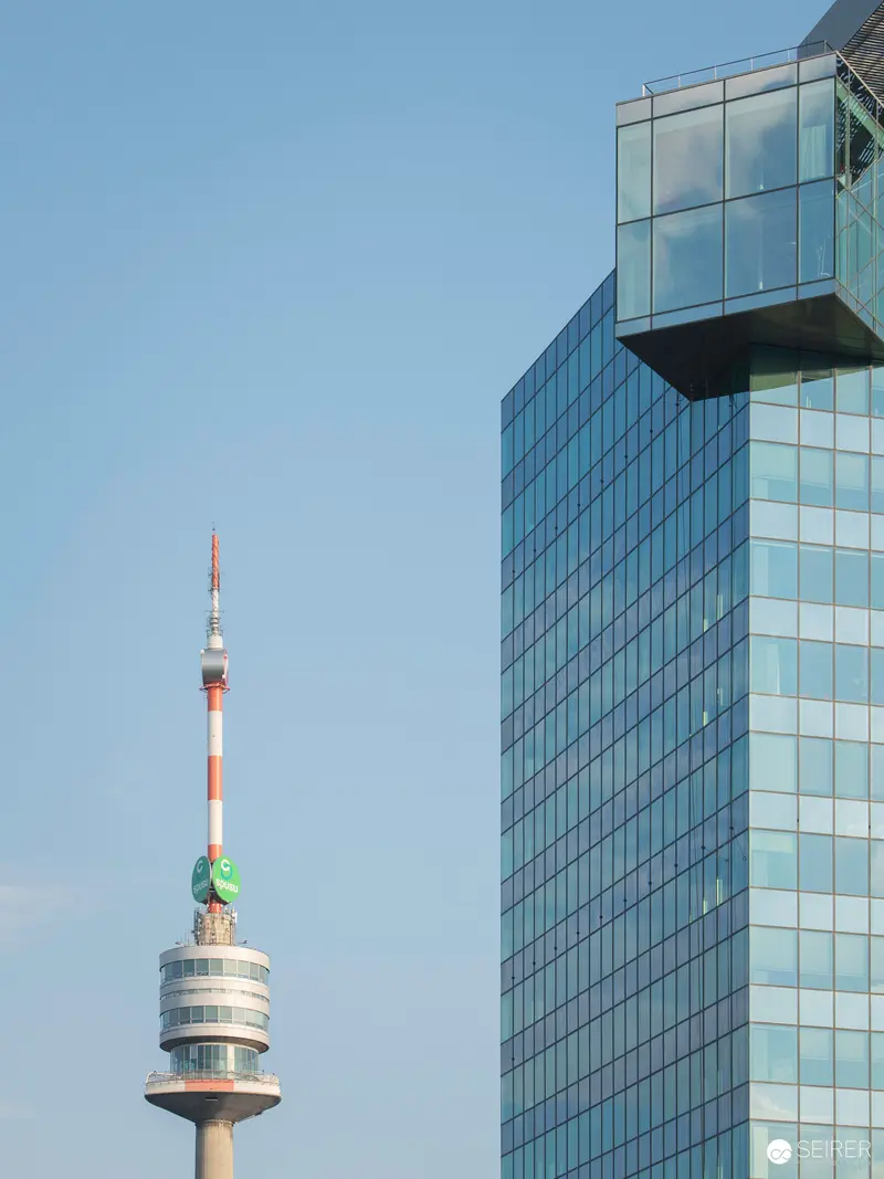 Modern Vienna Skyline with Donauturm Tower and Glass Office Building