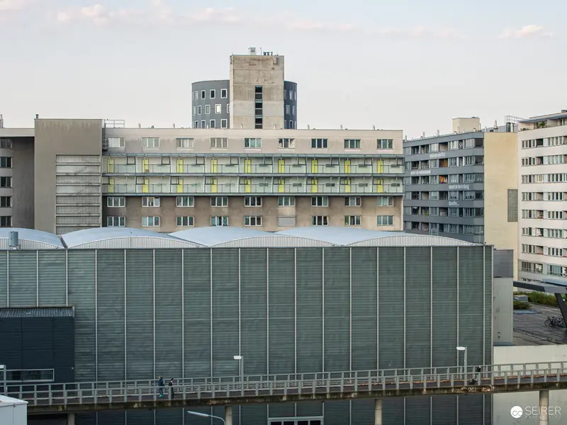 Concrete Urban Landscape with Modernist Apartment Blocks and Industrial Facade