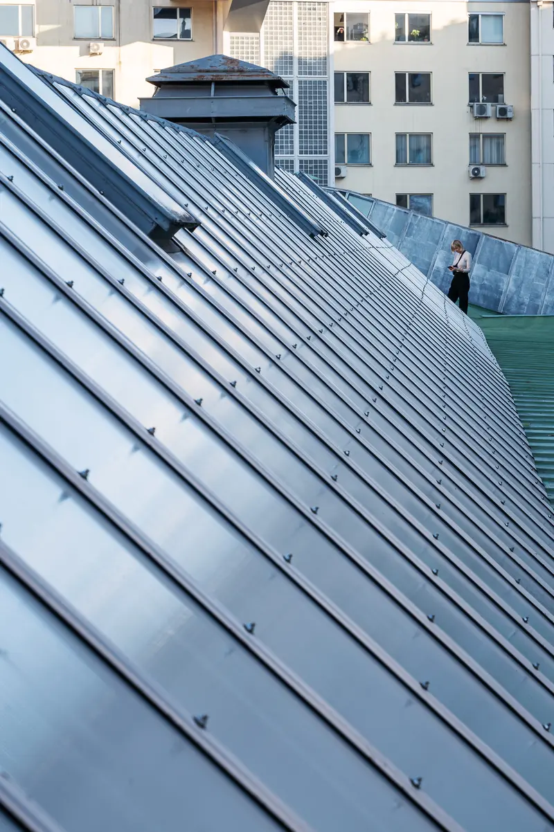 Metal Roof Panels on Urban Building with Geometric Linear Design