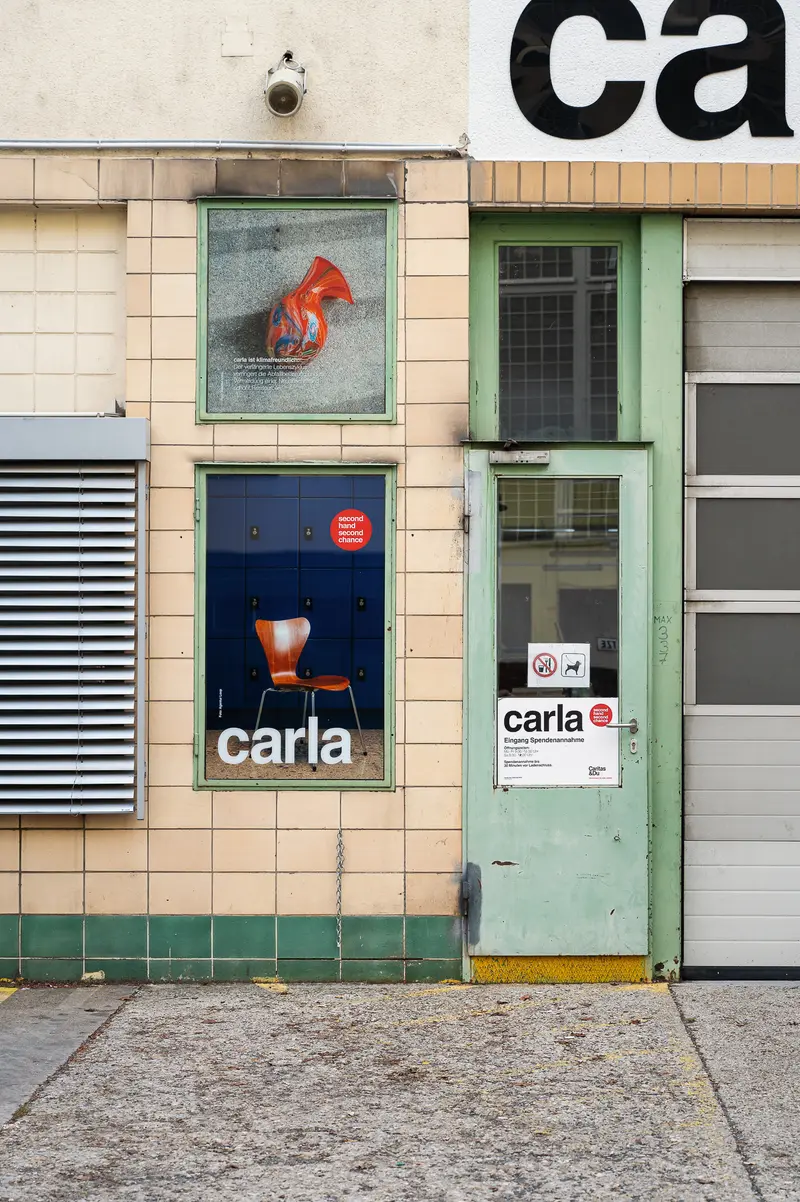 Carla Signage and Graphic Posters at Urban Building Exterior