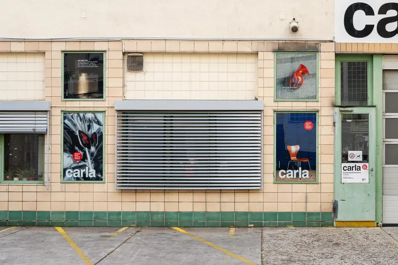 Carla Advertising Campaign Posters at Urban Building Exterior