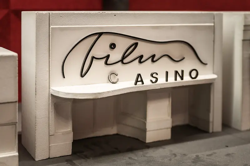 Film Casino White Architectural Model with Stylized Logo Signage