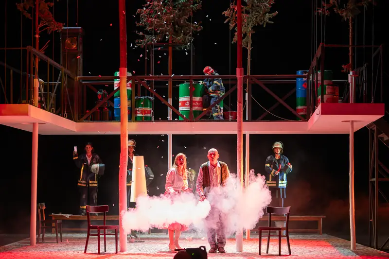 Dramatic Staging of "Biedermann und die Brandstifter" at Theater der Josefstadt