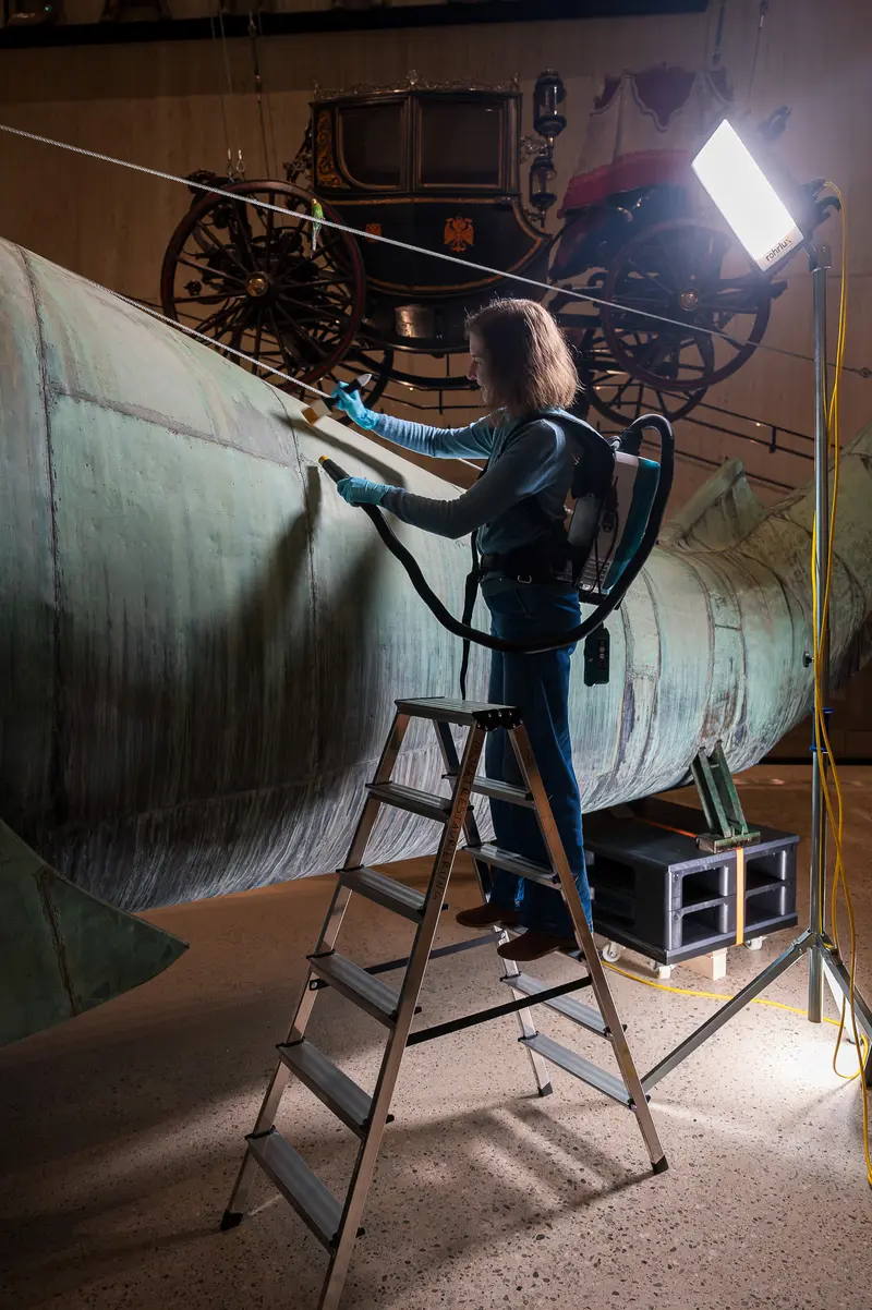 Conservator Restoring Prater Whale Sculpture 'Poldi' at Wien Museum, 2024