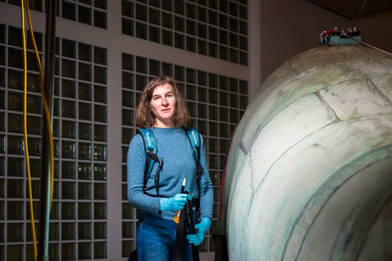 Conservation Professional Restoring Poldi Whale Sculpture at Wien Museum 2024