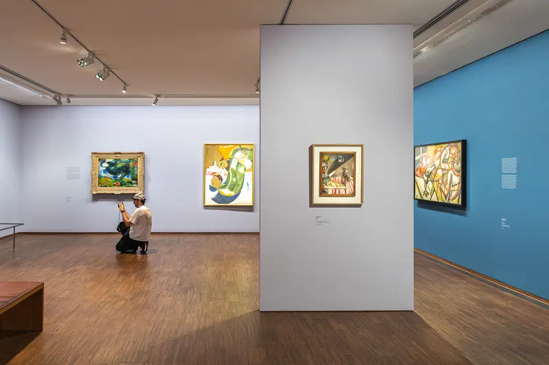 Chagall Exhibition Visitor Contemplating Artworks at Albertina Museum, Vienna