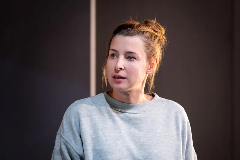 Actress in Gray Sweatshirt During "Nachtlacht" Theater Production