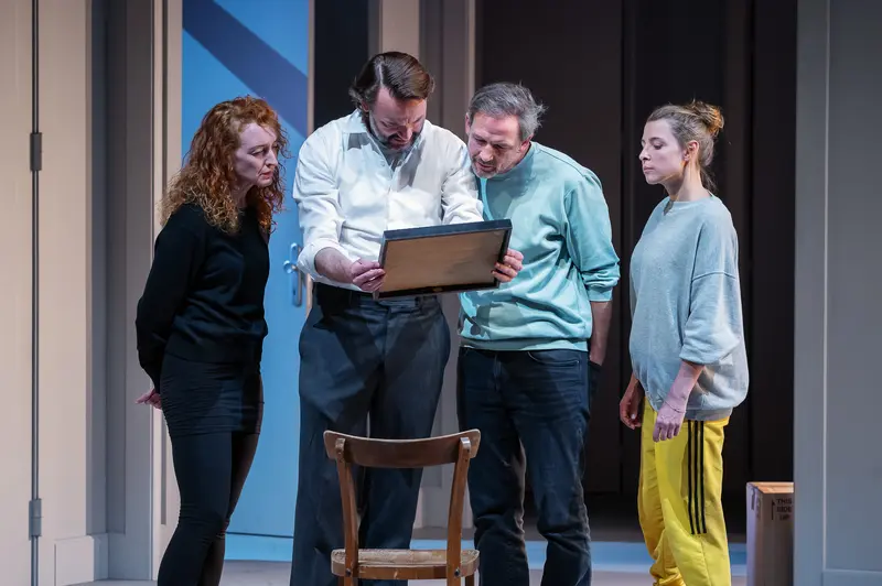 Cast of "Nachtlacht" Examining Laptop During Theatrical Performance at Kammerspielen