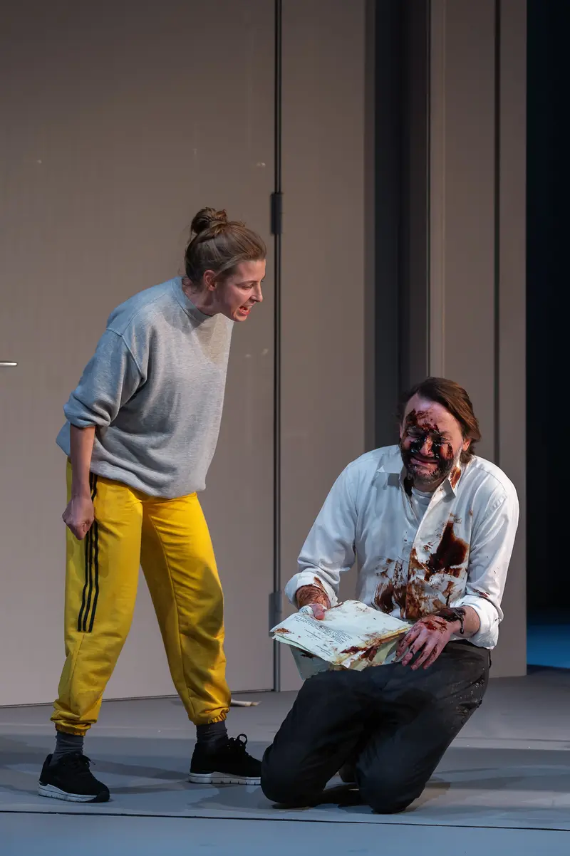 Dramatic Theater Scene from "Nachtlacht" at Kammerspielen, Two Actors in Intense Moment