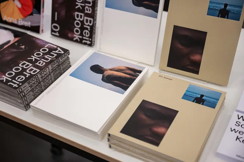 Book Presentation Showcasing Photography Books by Anna Breit and Eric Asamoah