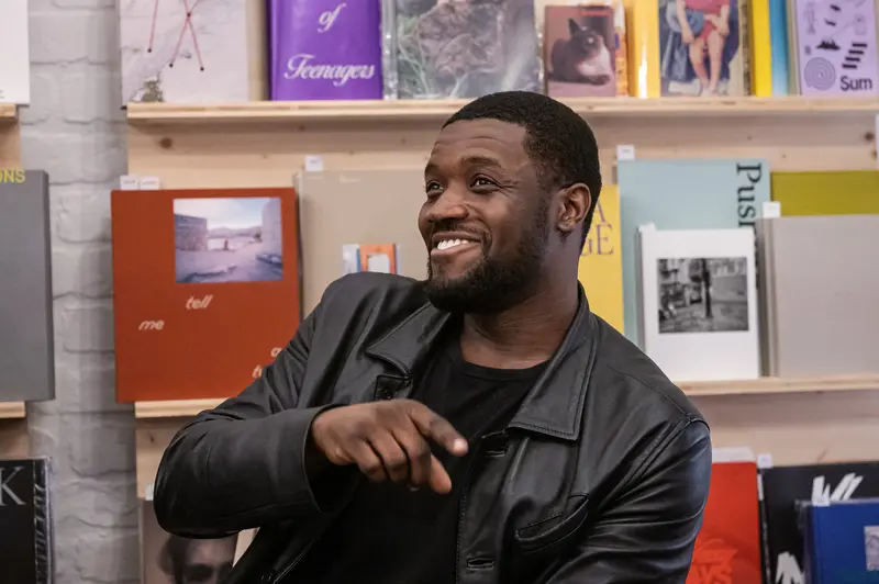 Eric Asamoah Speaking at Book Presentation with Anna Breit and Felix Hoffmann