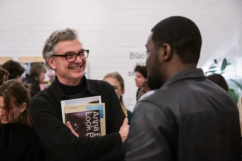 Eric Asamoah and Felix Hoffmann Engage During Book Presentation by Anna Breit