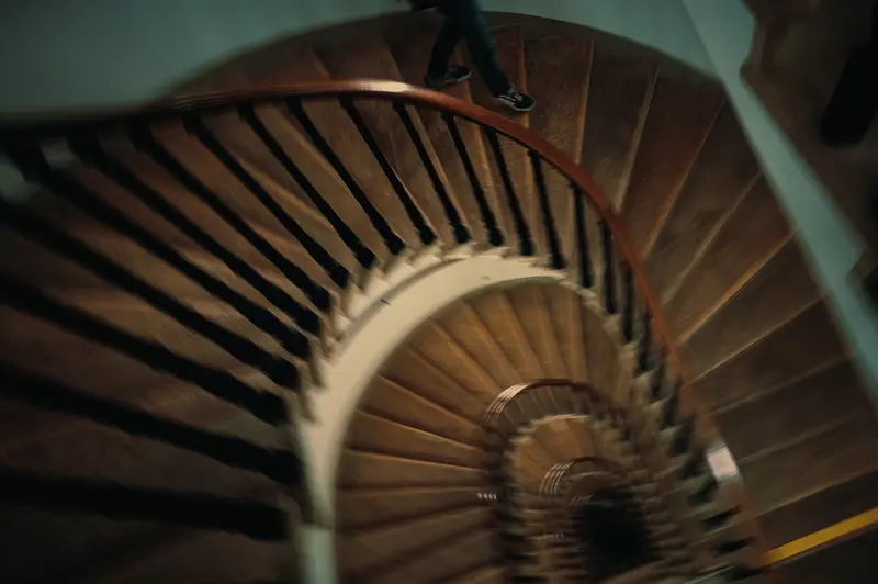 Spiral Wooden Staircase in Moody, Atmospheric Interior Perspective