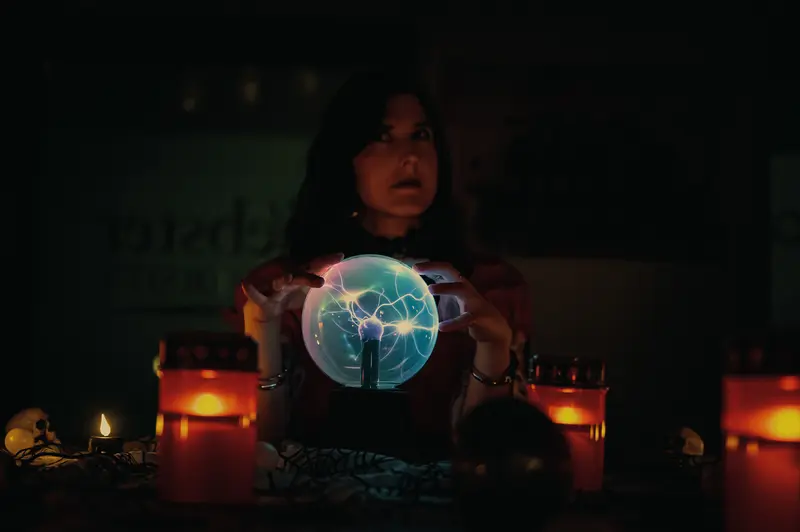 Mystical Halloween Séance with Glowing Plasma Sphere and Candles