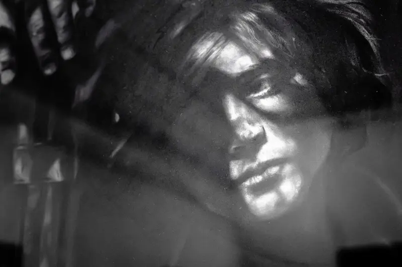 Shadowed Portrait in Black and White from Robert Long Exhibition