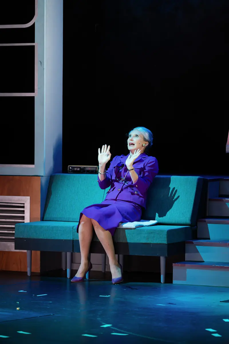 Solo Performance in Blue: Woman in Purple at Theater Production