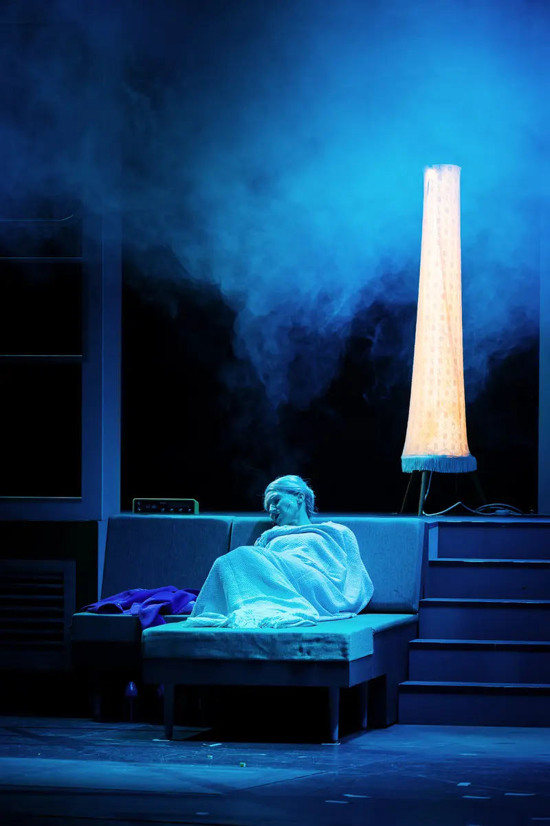 Blue-Tinted Stage Scene from "Miss Scrooge" Theater Production