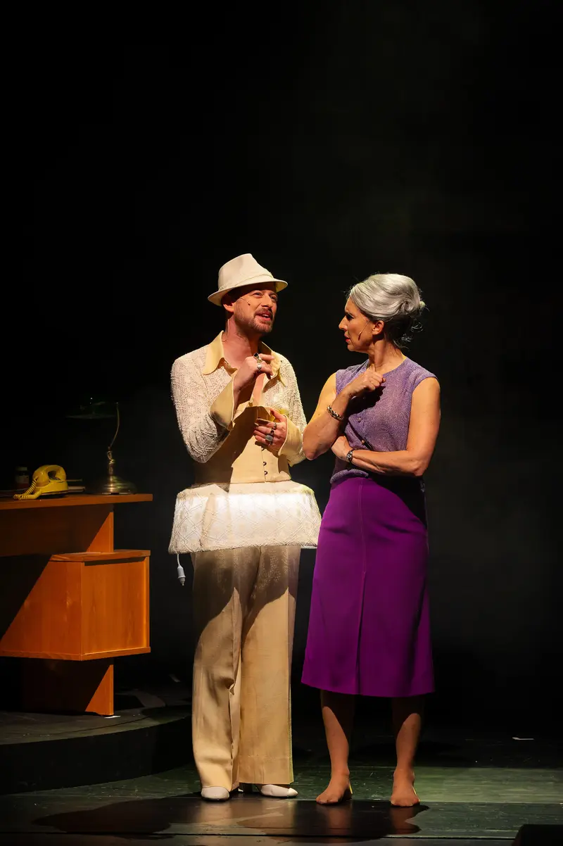 Miss Scrooge Theater Performance at Kammerspielen, Actors in Purple and White