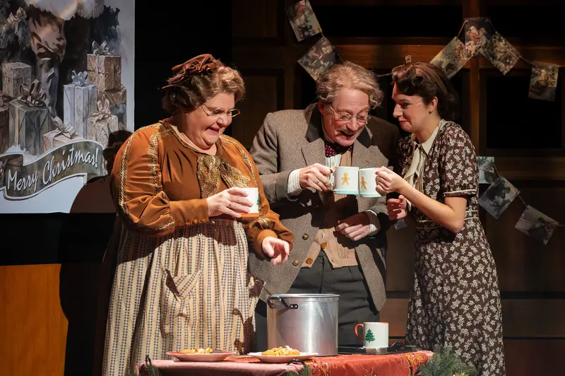 Three Actors Performing Christmas Scene in "Miss Scrooge" Theater Production