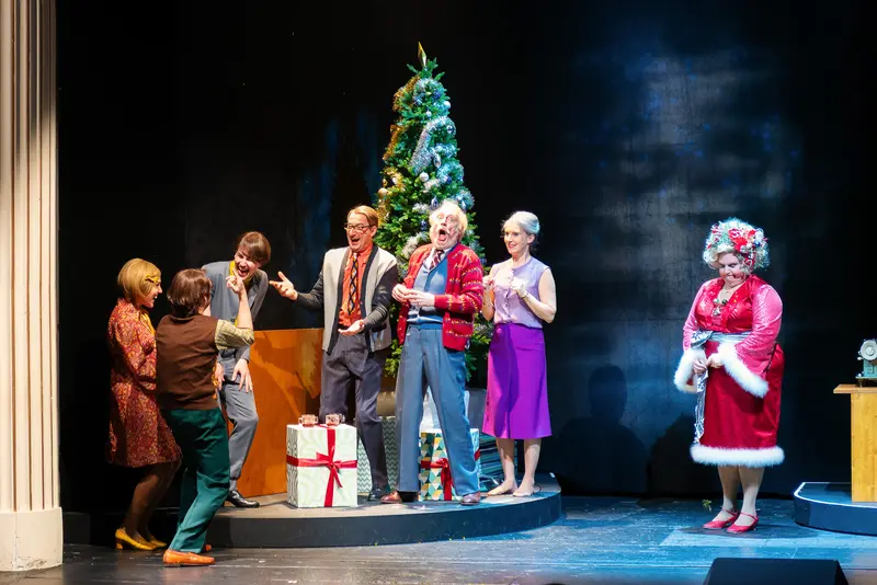Cast of "Miss Scrooge" Performing Christmas Scene at Kammerspielen Theater